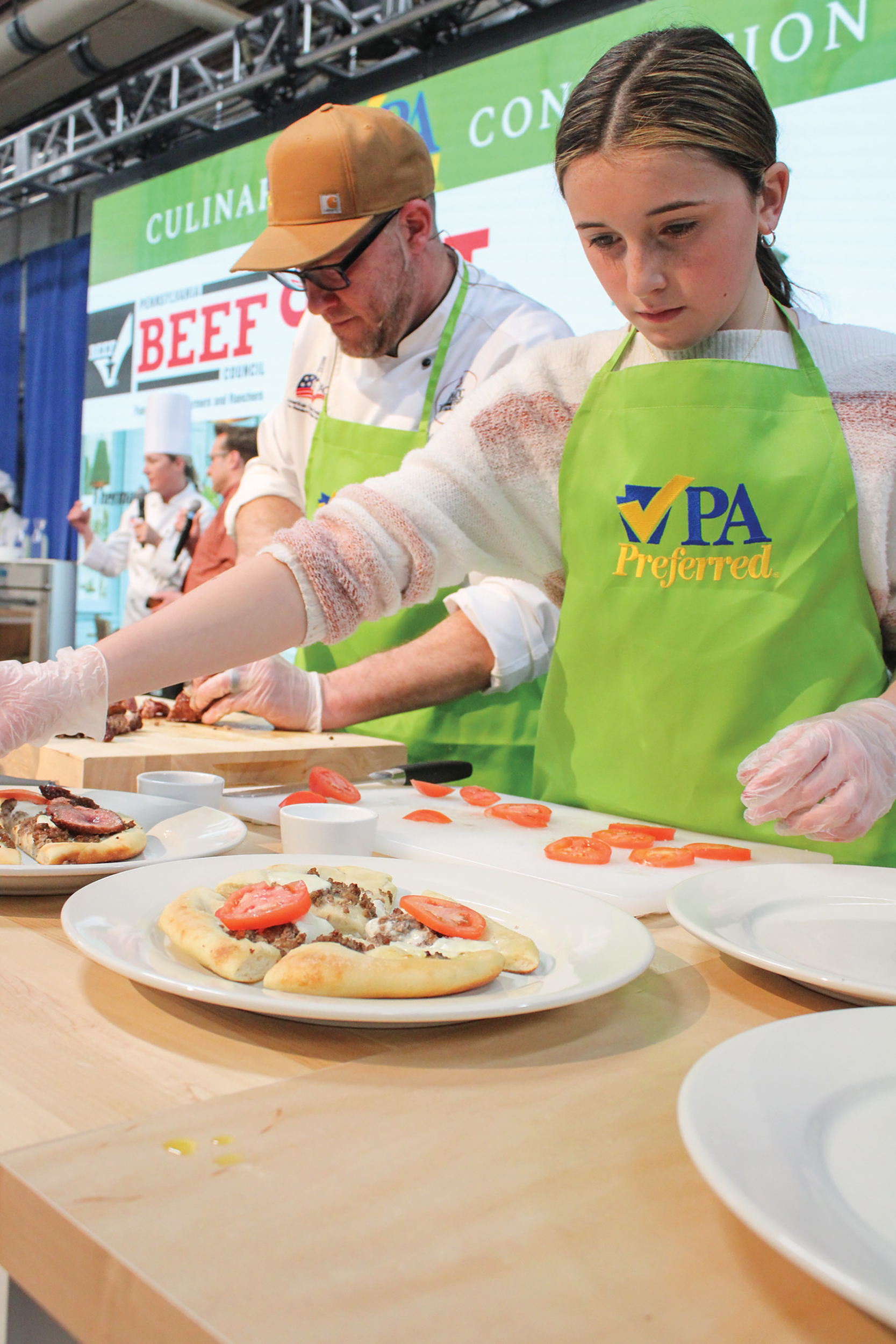 Landry Hockenberry, right, prepares food during The Beef Showdown: Kids Edition at the Pennsylvania Farm Show.
