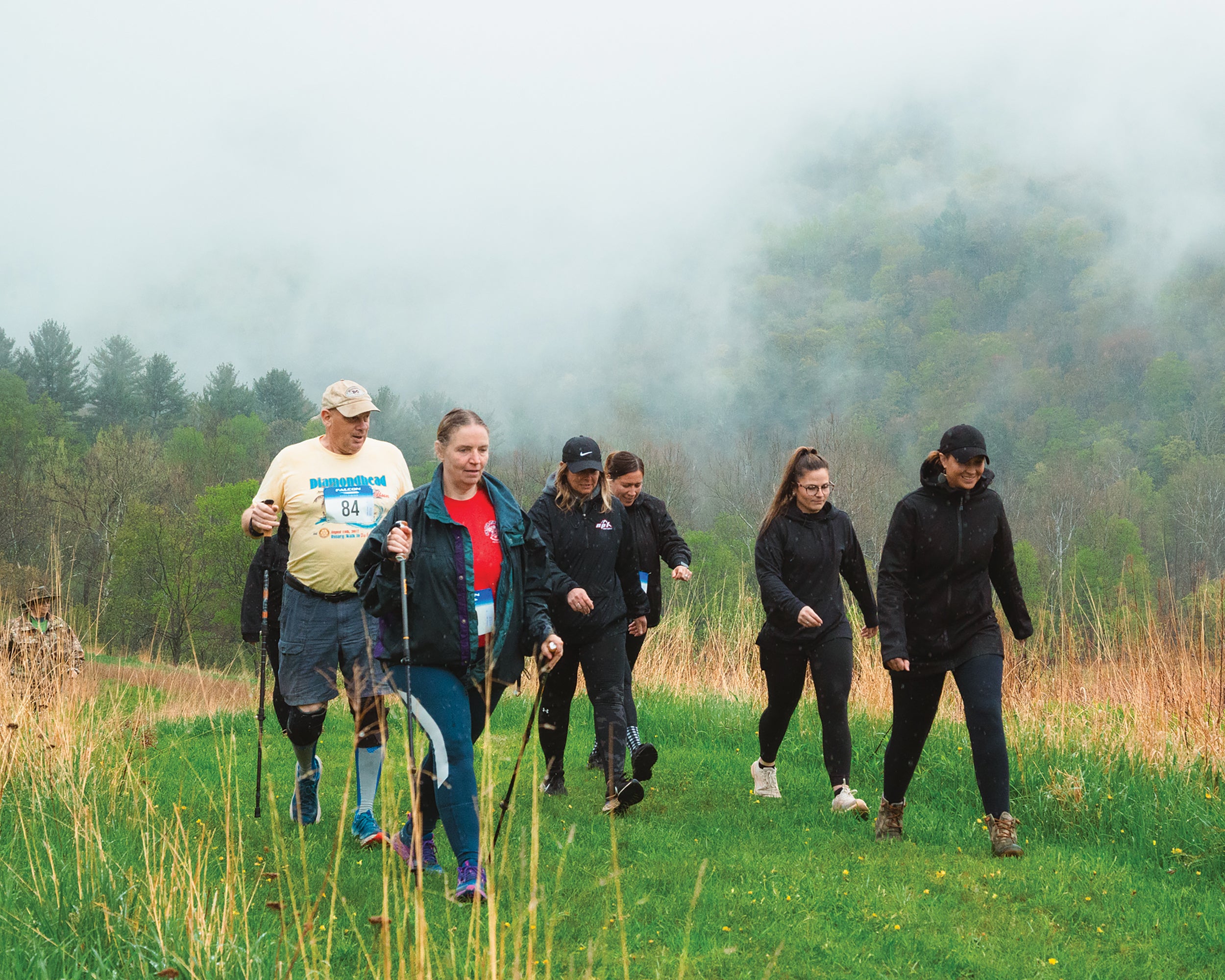 Participants in the recent 5K walk/run, sponsored by the Mill Cove Environmental Center in Tioga County, make the trek with smiles and conversation.