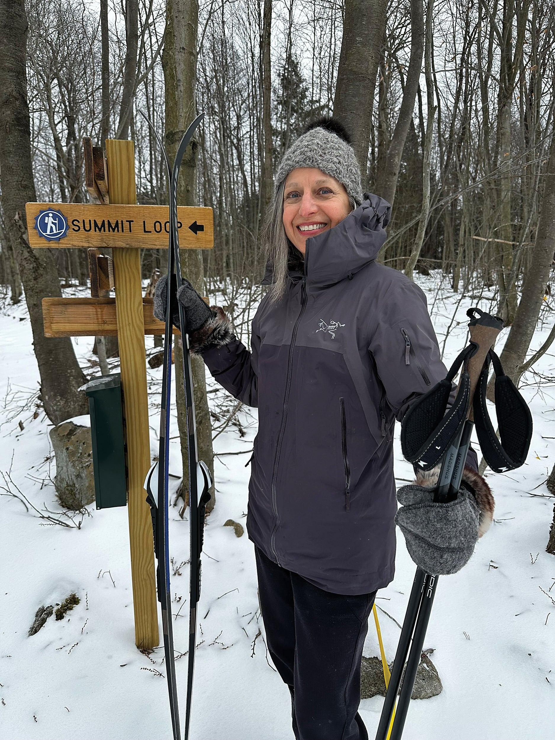Mary Baumunk Blondy pauses before setting out on cross-country skis along the Summit Loop