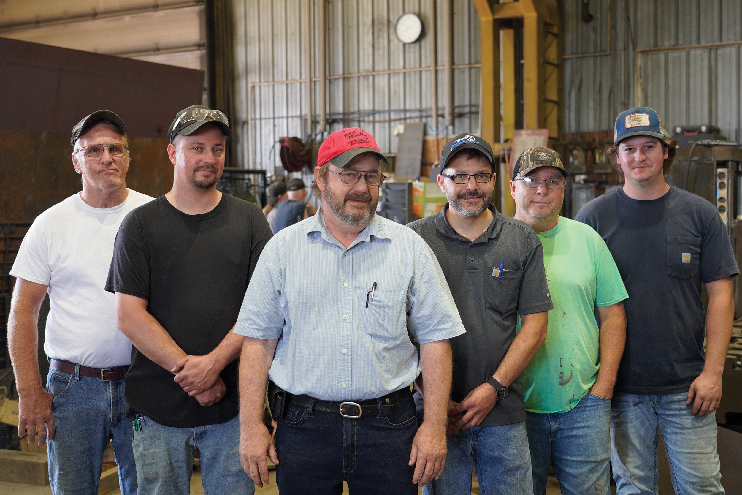 Tim Burkett, center, owner of R&S Machine Co. Inc. in Punxsutawney, attended Jefferson County Vo-Tech and has found success hiring other graduates from his alma mater.