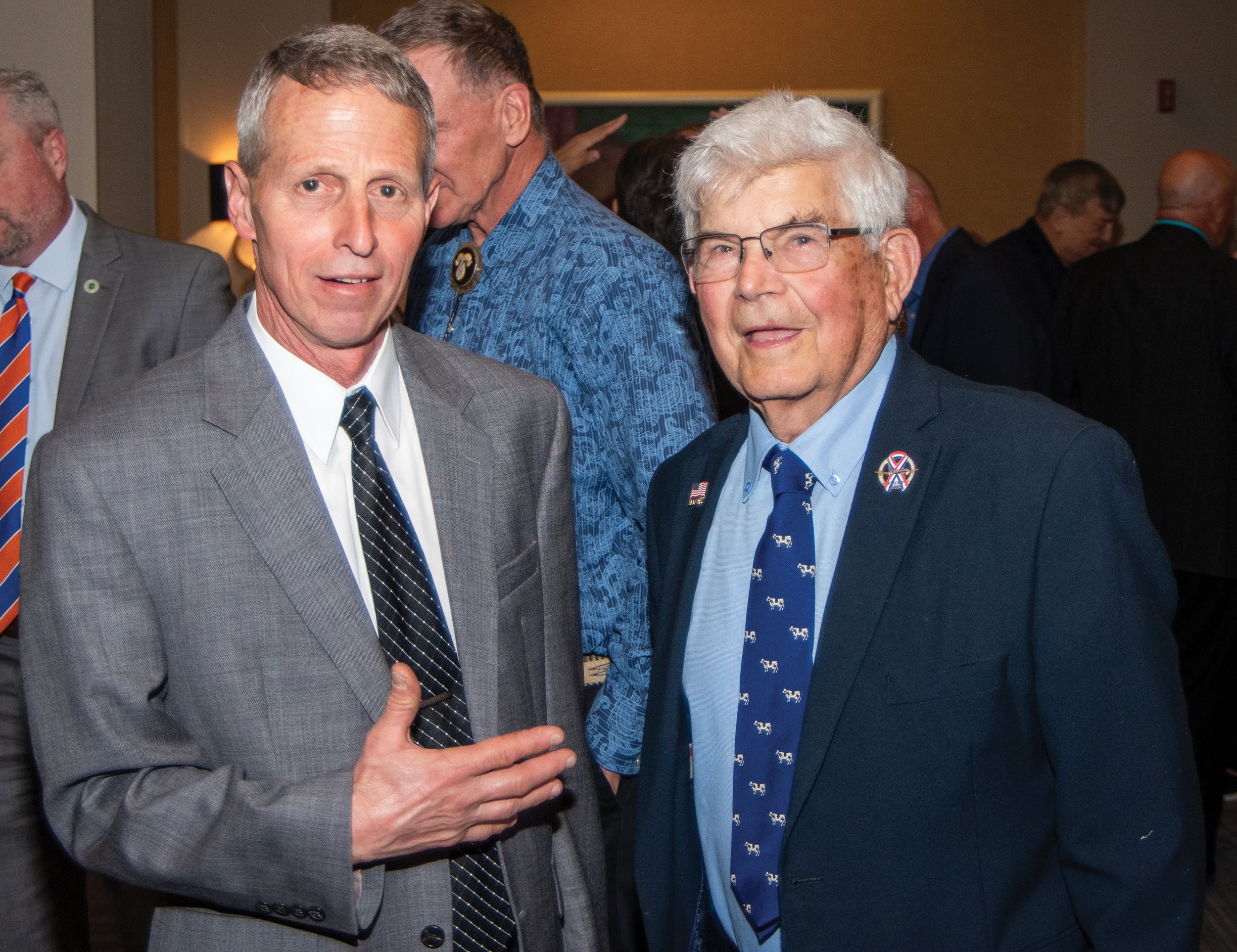 Board Chairman Jim Stauffer, left, who also chairs the Valley Rural Electric Cooperative (REC) Board of Directors, meets with Lowell Friedline, former Allegheny board chairman and recently retired member of the Somerset REC board, at the Pennsylvania Rural Electric Association’s Legislative Event.