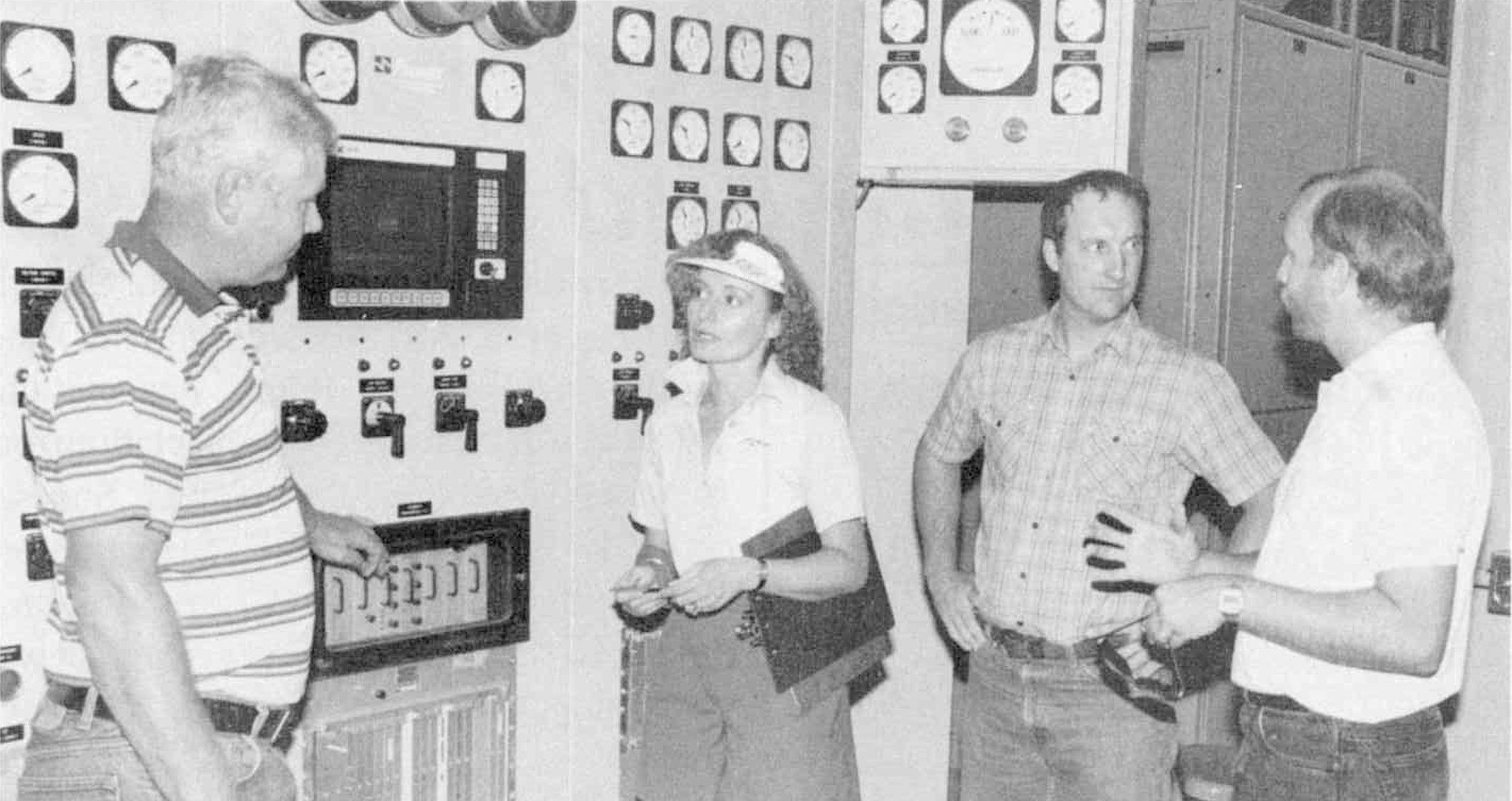 Mary Ann Hosko, former hydroelectric projects manager, and Bill Shearn, second from right, former plant superintendent, meet with representatives from the U.S. Army Corps of Engineers.