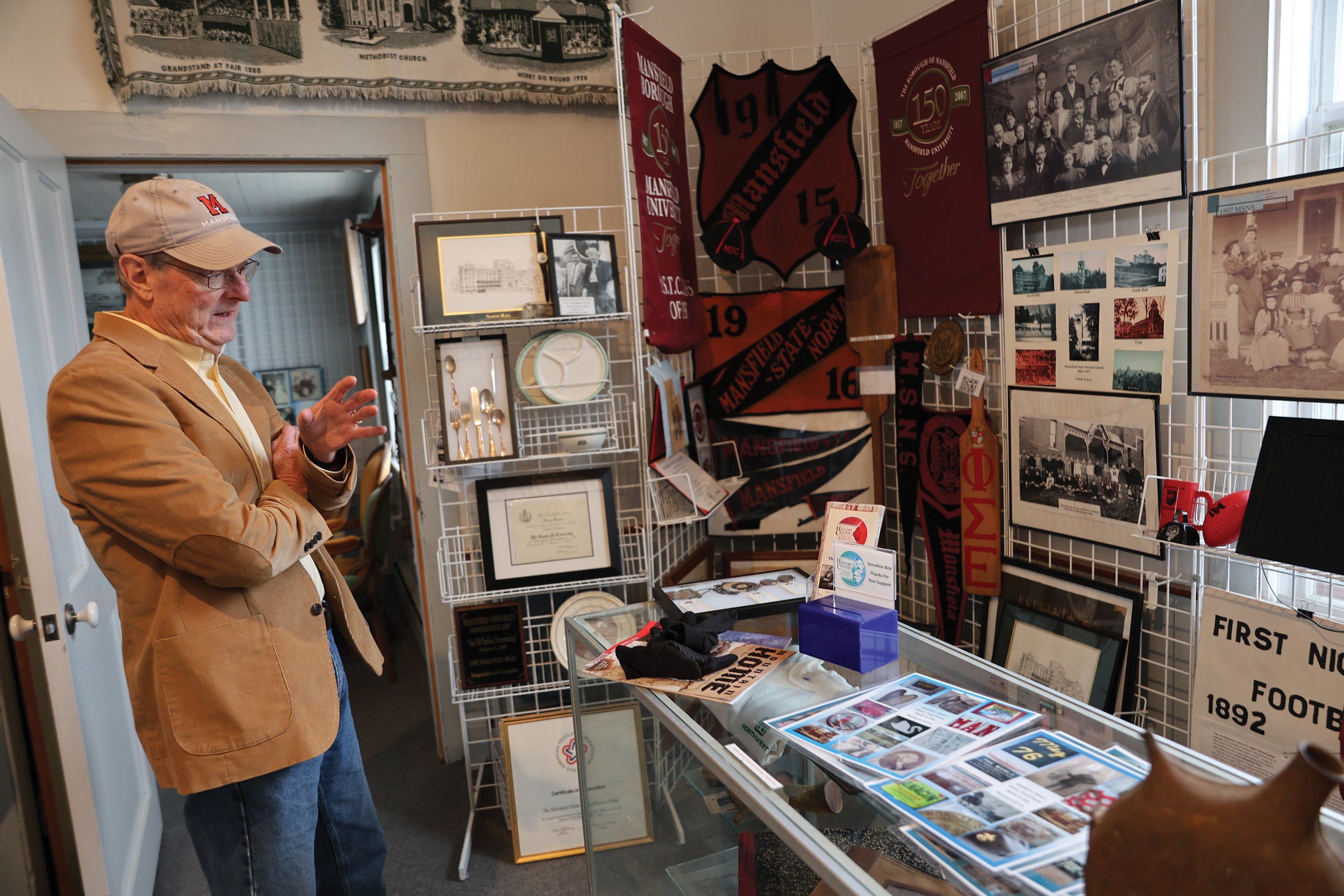 Steve McCloskey, known as “Mr. Mansfield,” reflects on the community — one of many along Route 6 — and its accomplishments at The History Center on Main Street.
